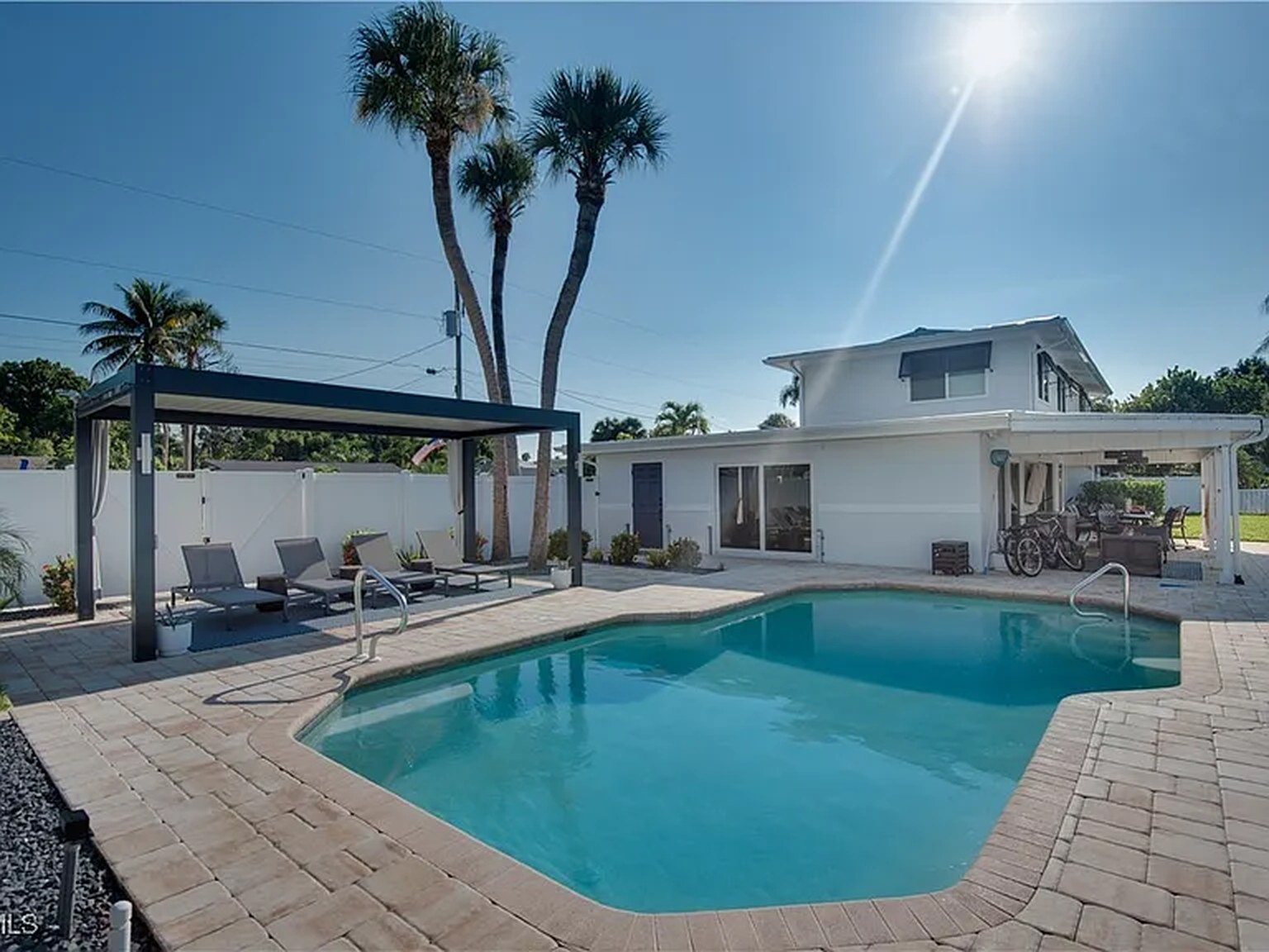 Private pool at OceanTimes, furnished travel-nurse housing in Fort Myers
